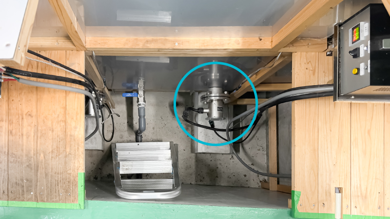 Flange heater installed on the below-grade water bath tank