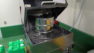 Custom container built to fit the existing washing machine